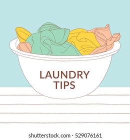 Vector laundry illustration. Basin with colorful clothes. Laundry basket