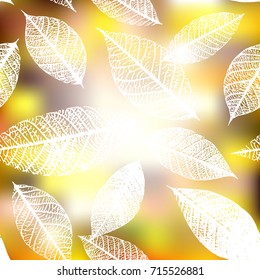 Vector leaf silhouettes on a blurred autumn background, fall banner or flyer design
