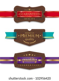 Vector leather quality labels with ribbon