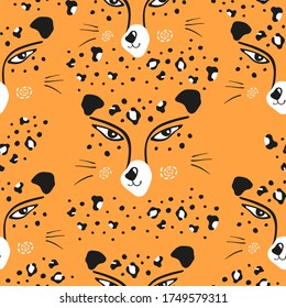 Vector leopard head seamless pattern. Leopard big wild cat repeating pattern. Design for printing on textiles, packaging, paper, wallpaper.