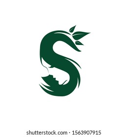 vector letter S in green for a spa logo with blank spaces in the shape of a face