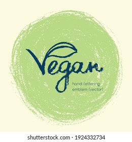 Vector lettering for vegan food icon. Handwritten vegetarian cooking emblem. Chalk texture. Hand drawn vegan label design. Leaf icon. Organic raw food concept. Stamp of vegetarian restaurant badge.