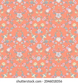 Vector Liberty pattern. Elegant floral pattern in small  flowers. Vintage print. Seamless texture, Orange background