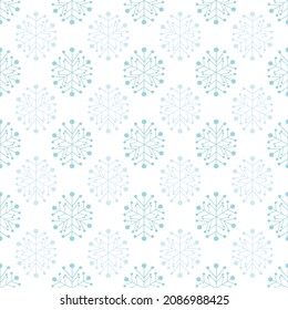 fondo de patrón sin interrupciones vectorial de copos de nieve azul claro