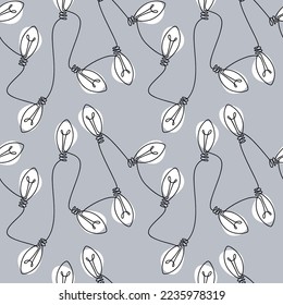 Vector light bulb vector icon seamless pattern. One line continuous hand drawn illustration. Wallpaper, graphic background, fabric, print, wrapping paper, banner, card.