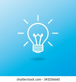 Vector lighted  black bulb on blue background. Isolated. Eps 10.