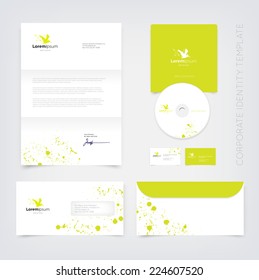 Vector lime green business stationary design template with flying pelican silhouette logo and paint splatter. Letter, envelope, cd and business cards. Modern branding collection.