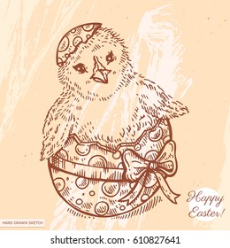 Vector linear illustration of the easter chick in the egg with bow. Hand drawn sketch with text Happy Easter on the background with abstract paper texture.