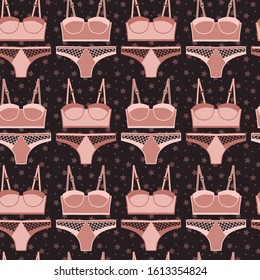 Vector lingerie pattern in orange and black. Simple outline bra & panties set hand drawn made into repeat. Great for background, wallpaper, wrapping paper, packaging, fashion.
