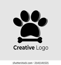 Vector logo of animal footprints and bones in black on white background