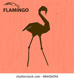 Vector logo bird. Standing flamingo. Stamping on the wooden background.