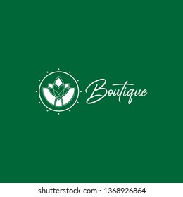 vector logo, boutique. with abstract and elegant flower shapes, green, attractive, modern, minimalist, simple
