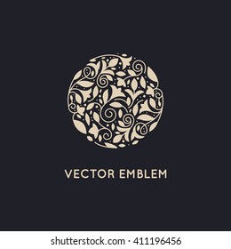 Vector logo design template and emblem made with leaves and flowers - luxury beauty spa concepts - natural badge for cosmetics