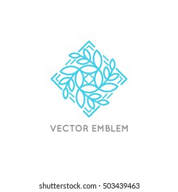 Vector logo design template and emblem made with leaves and flowers -  beauty and spa - badge for yoga classes, holistic centers, natural cosmetics - meditation and health concept