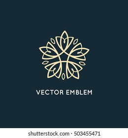 Vector logo design template and emblem made with leaves and flowers -  beauty and spa - badge for yoga classes, holistic centers, natural cosmetics - meditation and health concept