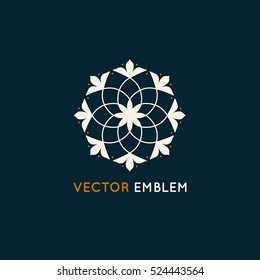 Vector logo design template and emblem made with leaves and lines - badge for yoga studios, holistic medicine centers, natural cosmetics, handcrafted jewelry and organic food products 