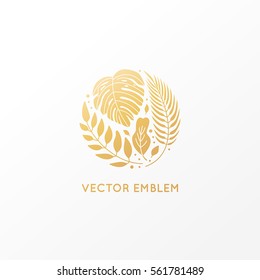 Vector logo design template and emblem made with golden palm trees - abstract sign with tropical leaves