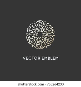 Vector logo design template and emblem made with leaves and flowers - luxury beauty spa concept - badge for yoga studios, holistic medicine centers, natural and organic food products and packaging 