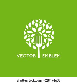 Vector logo design template - vegan food concept - icon and illustration for vegetarian cafe and product packaging designs - healthy, organic and natural emblem with green leaves and fork