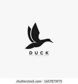 Vector Logo Illustration Duck Flying Silhouette Style