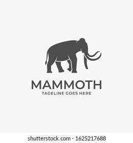 Vector Logo Illustration Mammoth Walking Silhouette