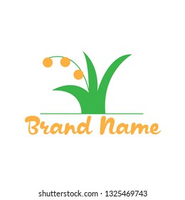 Vector logo with the image of summer fairy grass. Applicable for fairy tales, medicines, cosmetics and beauty. Colors green, orange.