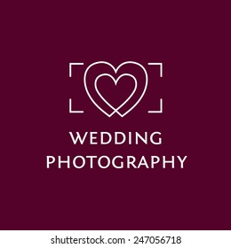 Vector logo with the image of the viewfinder and hearts. Wedding Photography.