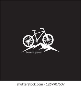 vector, logo, isolated mountain bike on a background of mountains, on a black background, emblem