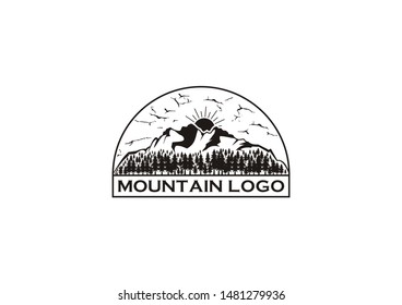 Vector logo of a mountain view with evergreen trees