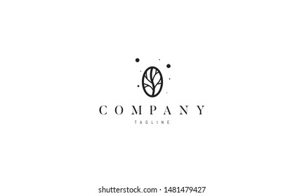 Vector logo on which an abstract image of a coffee grain in the center of which a tree silhouette.