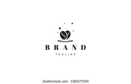 Vector logo on which an abstract image of coffee beans in the form of a heart.
