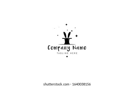 Vector logo on which an abstract image of a magician hat from which rabbit ears stick out.