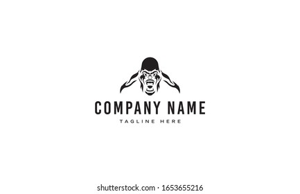 Vector logo on which the abstract image of the gorilla is furious.