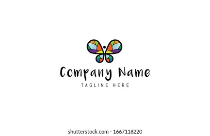 Vector logo on which an abstract image of a multi-colored butterfly.
