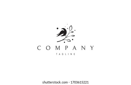 Vector logo on which an abstract image of a bird sitting on a branch with leaves.