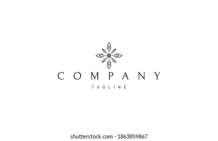 Vector logo on which an abstract image of a floral pattern in the form of a cross.