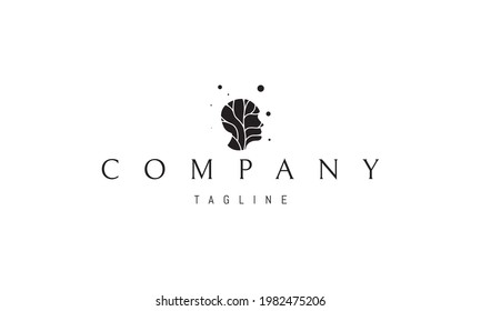 Vector logo on which an abstract image of a human head with a silhouette of a tree inside.