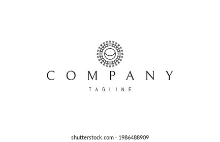 Vector logo on which an abstract image of the alchemical symbol of the sun and moon in a linear style.