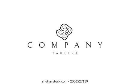 Vector logo on which an abstract image of a cut of a tree.