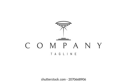 Vector logo on which an abstract image of a table lamp with the sun instead of a light bulb.