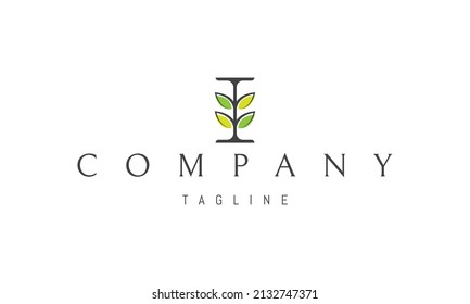 Vector logo on which an abstract image of an ear with green juicy leaves.