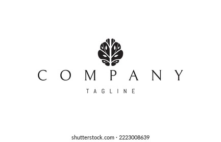 Vector logo on which an abstract image of the human brain with a silhouette of a tree in the middle.