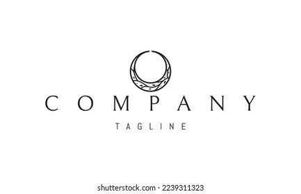 Vector logo on which an abstract image of an inverted moon with a tree pattern inside.