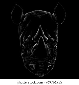 The Vector logo rhinoceros for T-shirt design or outwear.  Hunting tattoo rhinoceros  style background.