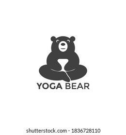 Vector logo silhouette of a bear meditating on yoga
