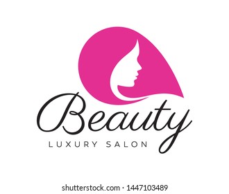 Vector logo with silhouette of female head. Text Beauty Luxury Salon. Isolated on white background