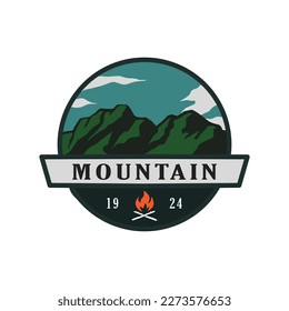 vector logo or symbol of mountain with bonfire