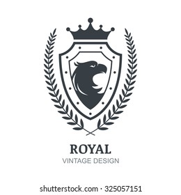 Vector logo template. Eagle, crown, shield and laurel branch symbol. Luxury decorative emblem for boutique, hotel, restaurant, heraldic.