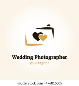 Vector logo template for wedding photographer. Illustration of camera with two hearts, black and brown.