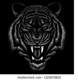 
The Vector logo tiger for T-shirt design or outwear.  Hunting style tiger  background.